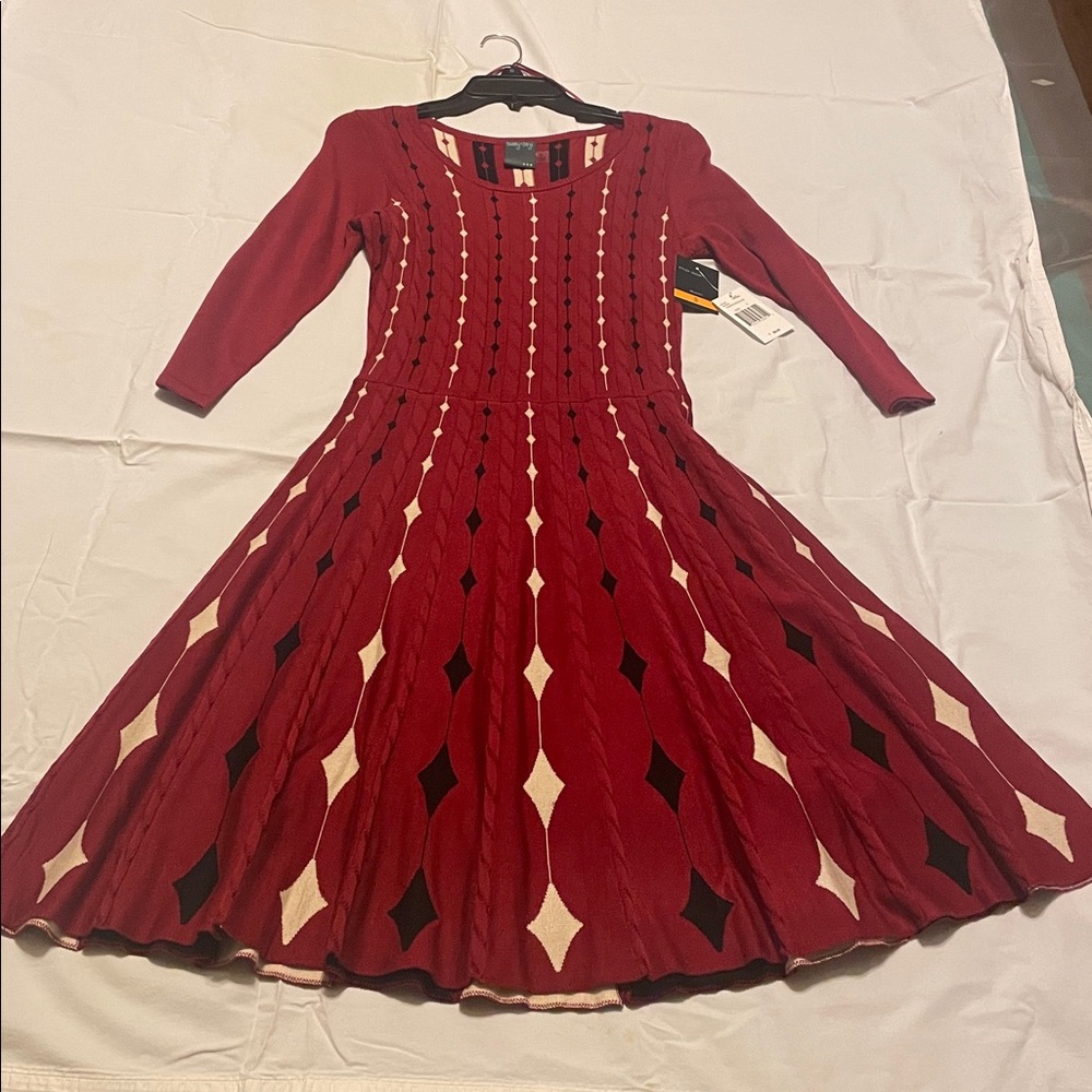 Clear out sale! NWT Garnet red sweater dress with black and sand diamond detail.